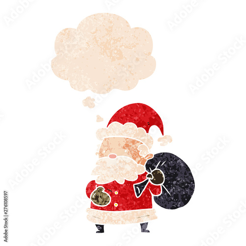 cartoon santa claus and thought bubble in retro textured style