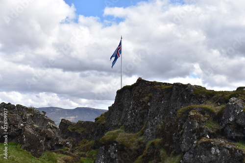 Icelandic flag at the Thingvellir National Park near Reykjavik at the Golden Circle in Iceland