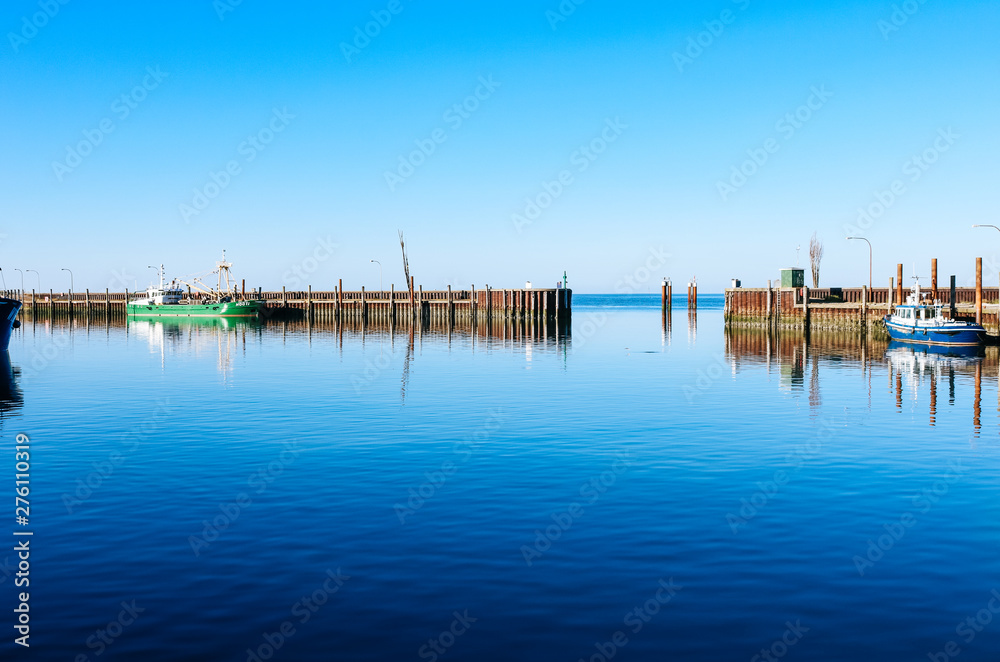 Calm blue water and sky scenery of the harbour in Hörnum, Sylt, Germany