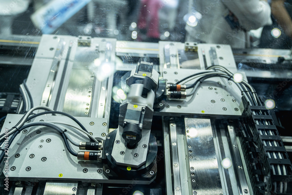 automation machine and detail close up in machine automatic with robotic automation technology for technology production factory automation machine and detail close up in machine automatic with robotic automation technology for technology production factory