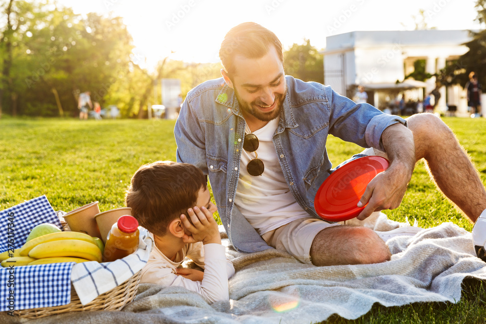 Fototapeta premium Two happy brothers spending time at the park