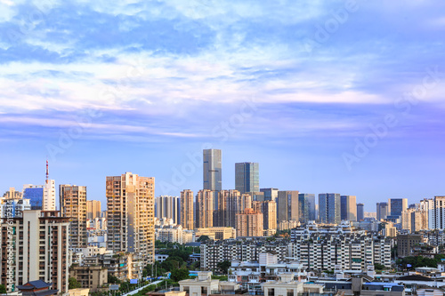Landscape of the city skyline at dusk, in Aerial view with skyscraper, modern office building and blue sky background in Fuzhou,Fujian,China.