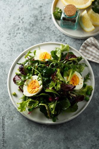 Green salad with hard boiled eggs