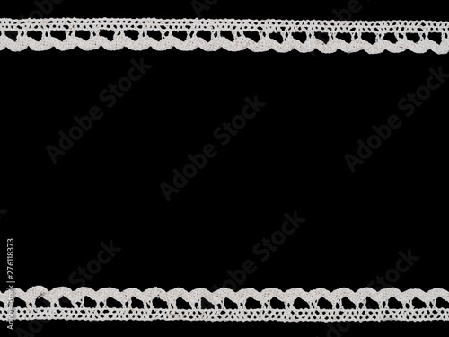 White laces on black background