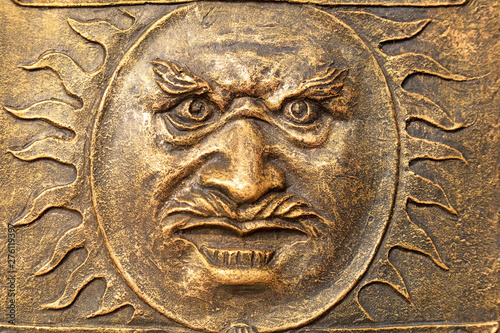 Character faces on copper metal plates