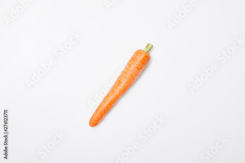 top view of organic carrot on white background