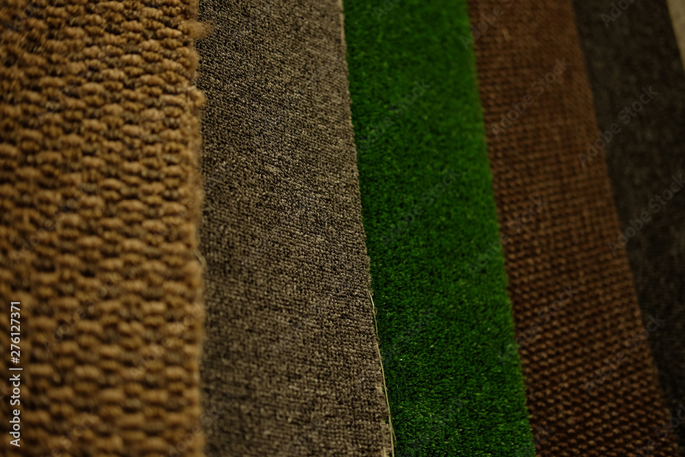 Colorful carpet samples on exhibition for retail  - obrazy, fototapety, plakaty 