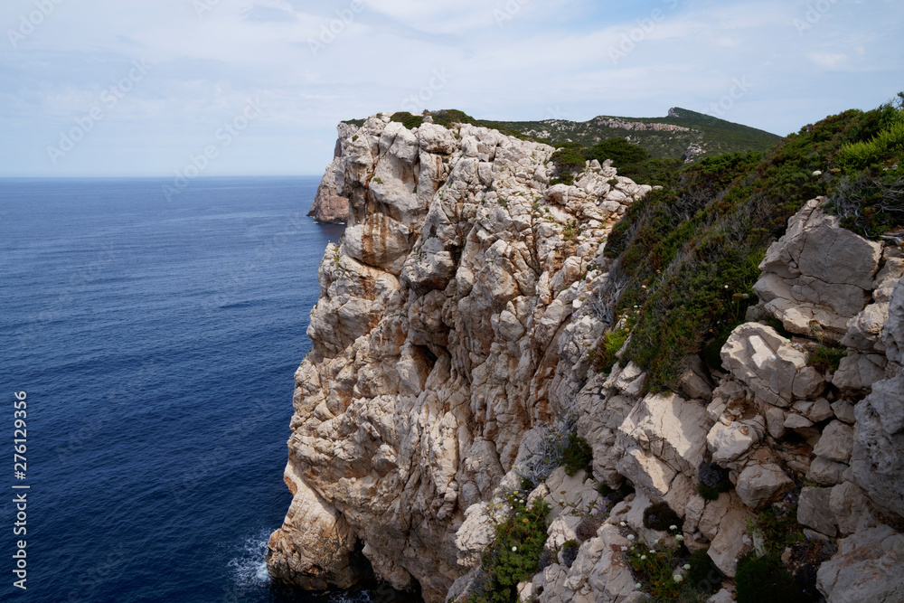 Capo Caccia, Foradada. Imposing white limestone cliff, in Sardinia/Sardegna, Italy