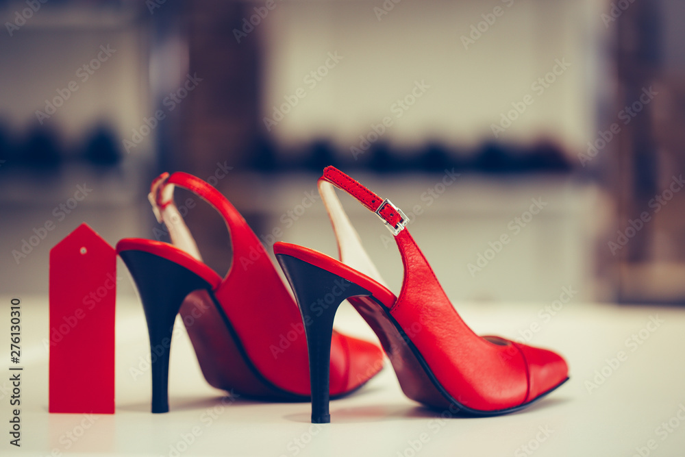 Close up shot of red elegant high heels women shoes Close up shot of red elegant high heels women shoes