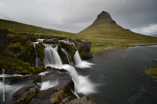 Famous kirkjufell mountain with the kirkjufell falls waterfalls in front in Grundarfj  dur in Iceland