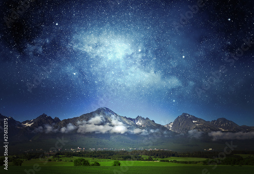 Night sky with the Milky Way over the Tatras mountains. Europe.