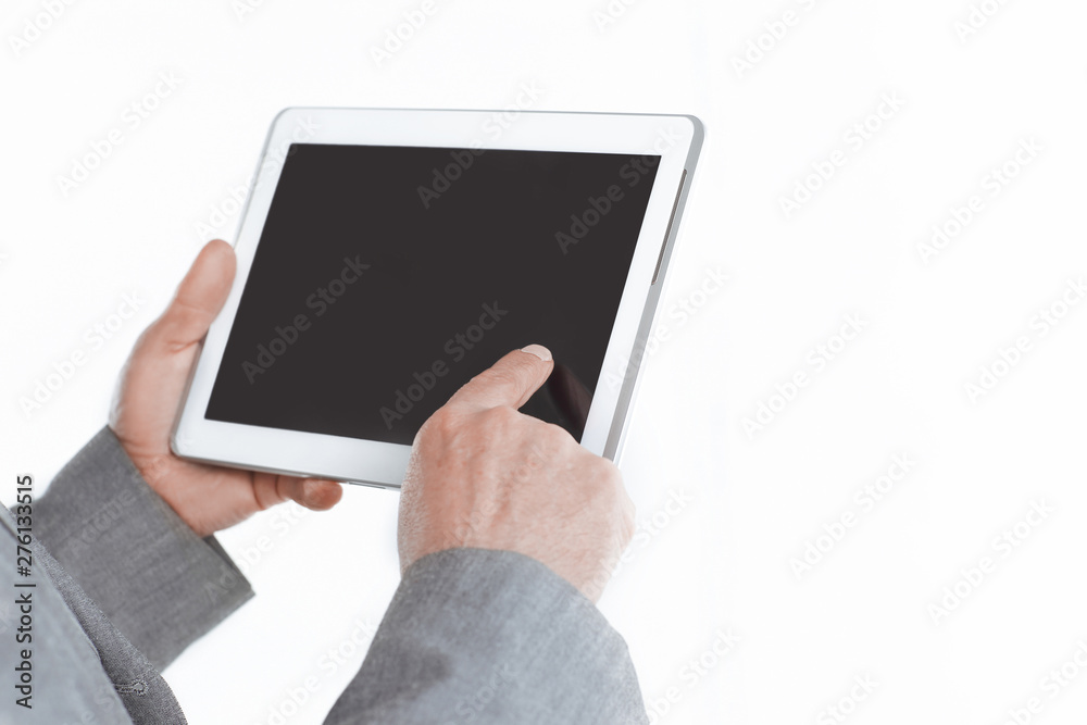 close up.businessman pointing finger at the blank screen tablet.isolated on white background close up.businessman pointing finger at the blank screen tablet.isolated on white background