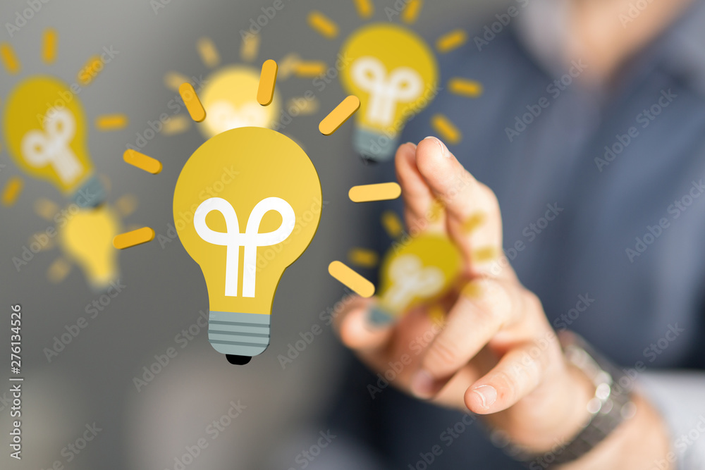 holding illuminated light bulb, idea, innovation and inspiration concept. holding illuminated light bulb, idea, innovation and inspiration concept.