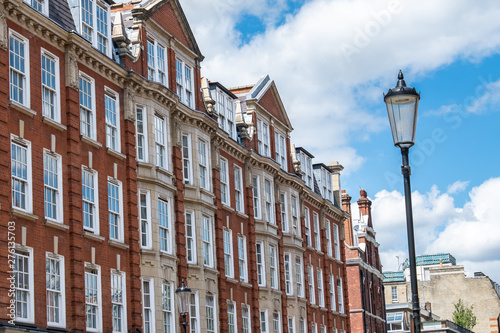 A row of attractive terraced British townhouses