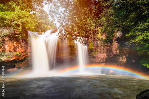 Here is the paradise on the world.The waterfall and beautiful perfect rainbow.Natural will always comfort you and make you feel comfortable.Large trees help this pic feel naturally, rainy season