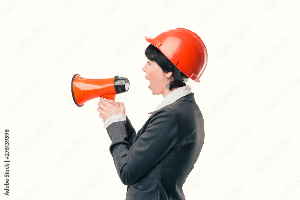 Fototapeta premium female architect with a megaphone.isolated on light