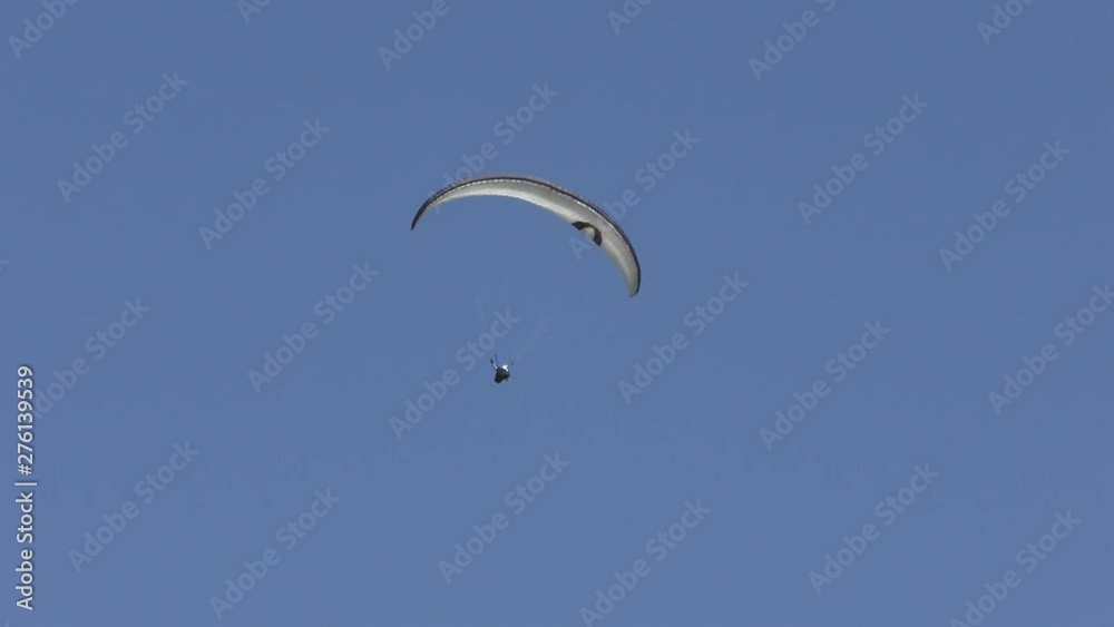 Paragliding over mountains to the valley 4K video Paragliding over mountains to the valley 4K video