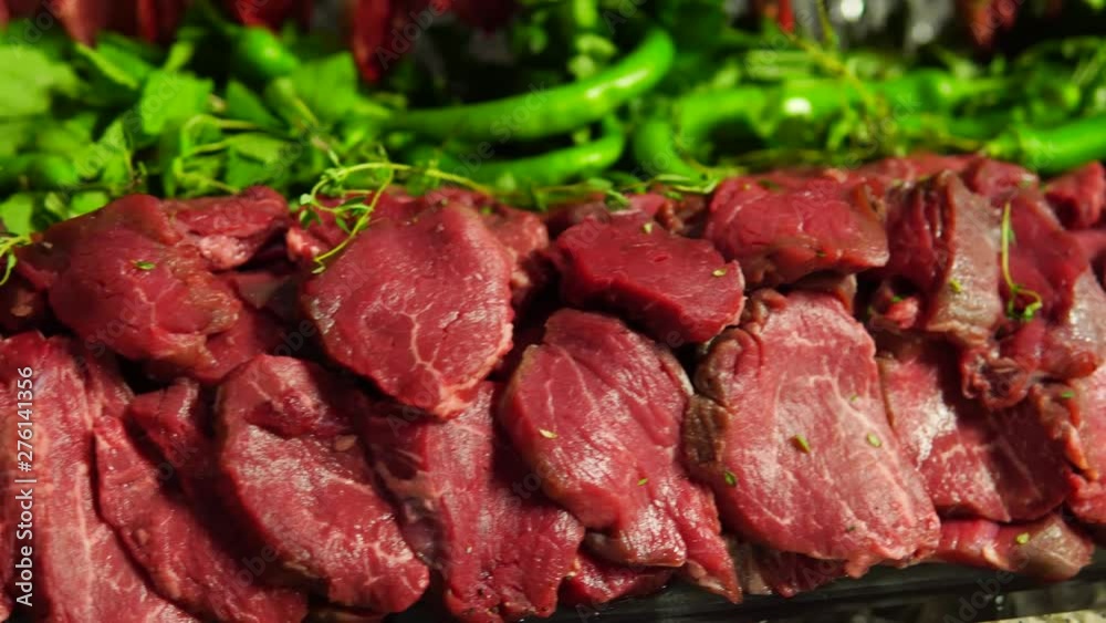 Raw meat. Cut pieces of meat for cooking on the grill.