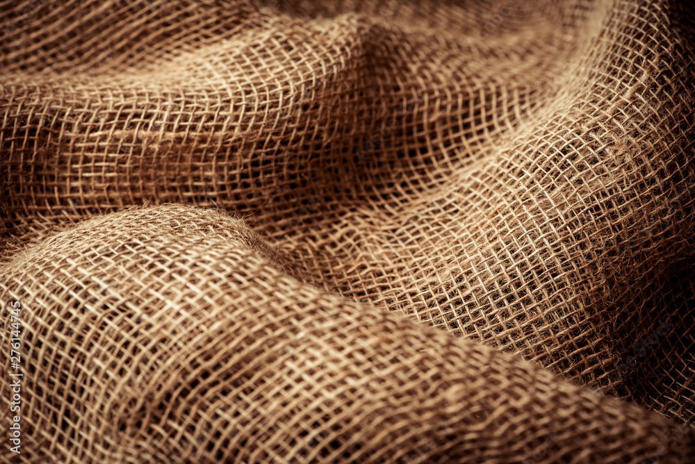 Brown sackcloth texture, background, selective focus Brown sackcloth texture, background, selective focus