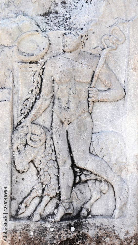 Antique bas-relief with god Hermes and ram image, Ephesus, Turkey