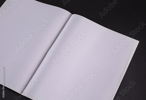 Magasine opened pages template mockup against a black background