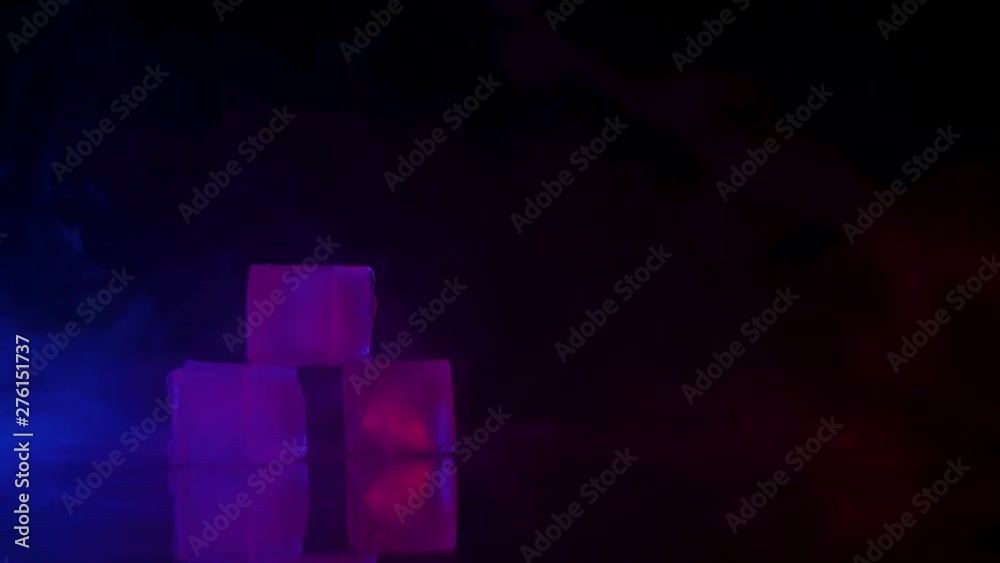 3 ice cubes on a table at a party for coctail 3 ice cubes on a table at a party for coctail