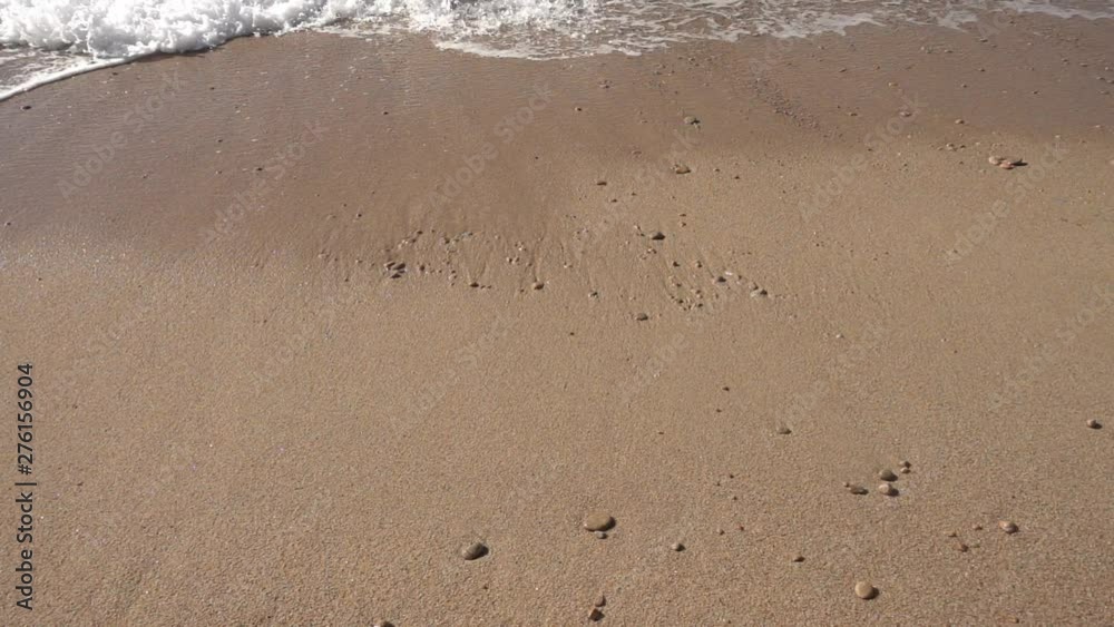 The wave coming to the beach in slow motion The wave coming to the beach in slow motion