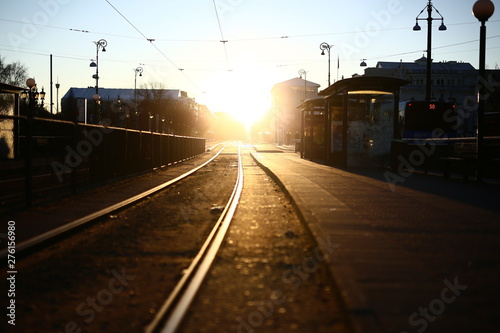Early winter morning on a tram stop with strong sunlight on the Avenue, Gothenburg, Sweden