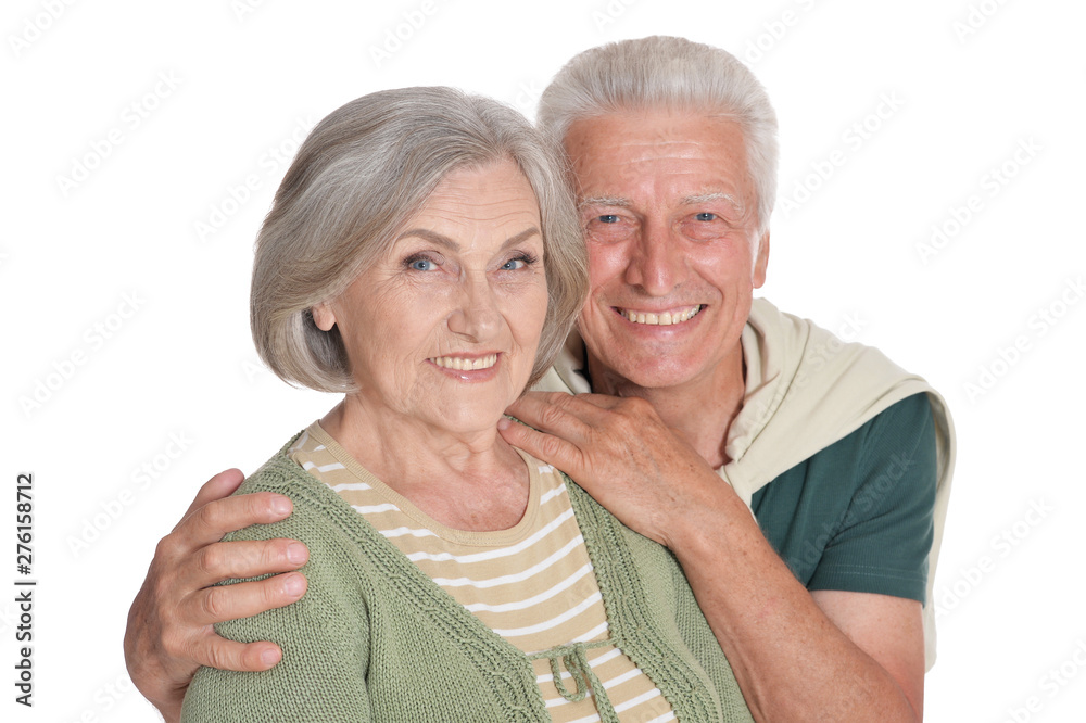 Portrait of happy senior couple embracing on white background Portrait of happy senior couple embracing on white background