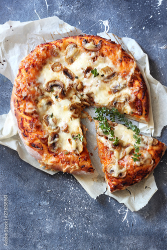 Homemade pizza with mushrooms