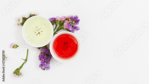 Top view pair of teacups with flowers