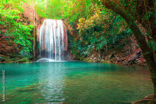 Hot Springs Onsen Natural Bath Surrounded by red-yellow leaves.Waterfalls in the emerald blue water in Erawan National Park.beautiful natural rock waterfall in Kanchanaburi  Thailand.