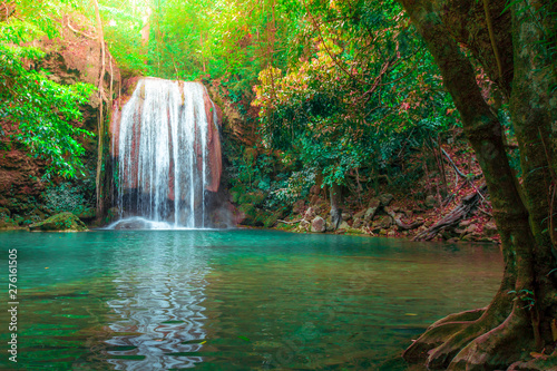 Hot Springs Onsen Natural Bath Surrounded by red-yellow leaves.Waterfalls in the emerald blue water in Erawan National Park.beautiful natural rock waterfall in Kanchanaburi  Thailand.