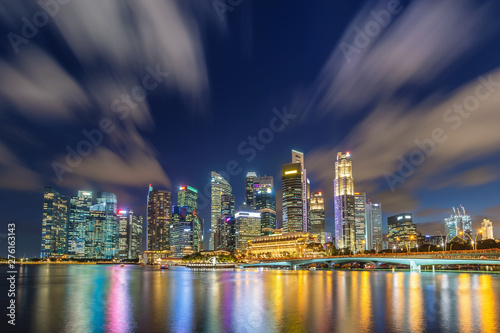 Singapore night city skyline at Marina Bay and Singapore business district