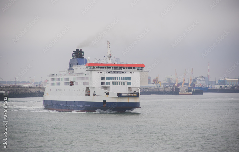 Large passenger ferry leaving Calais harbour Large passenger ferry leaving Calais harbour