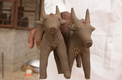 Bullocks made with mud clay, made during the festival at the start of the Monsoon in North Karnataka. photo