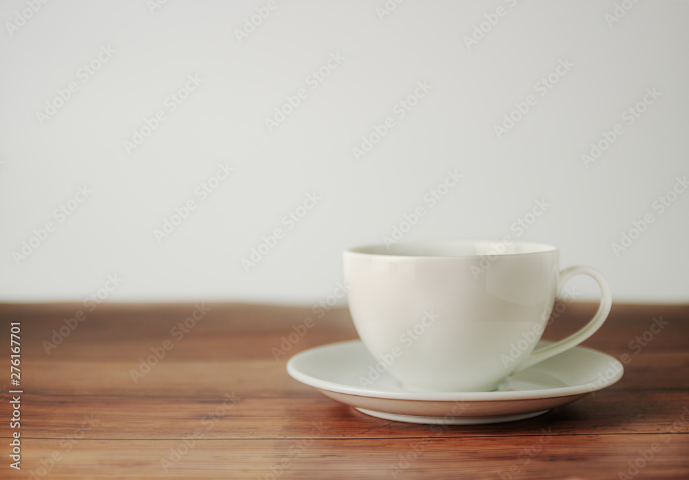 A cup of coffee on wooden background A cup of coffee on wooden background