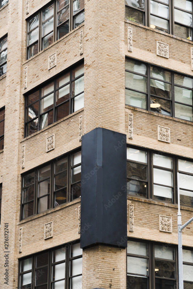 Fototapeta premium Big billboard template on building in city