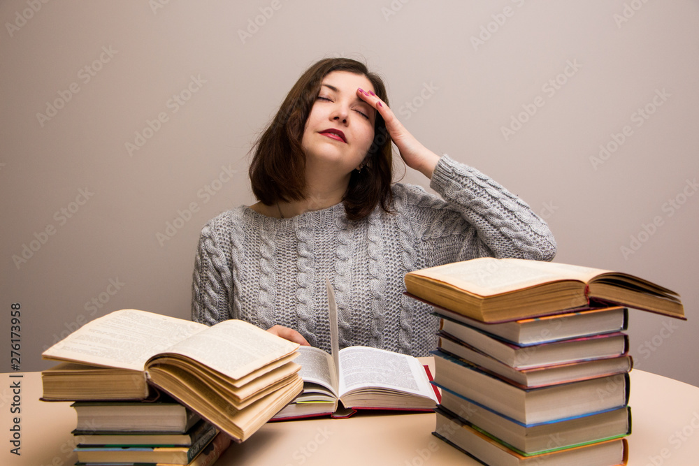 Student girl with stack of books Student girl with stack of books
