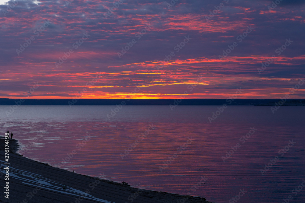 Naklejka premium sunset on the Volga ,shot on a summer evening on the waterfront in Cheboksary in Russia