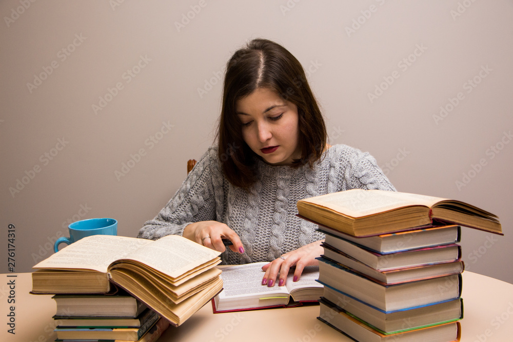 Student girl with stack of books Student girl with stack of books