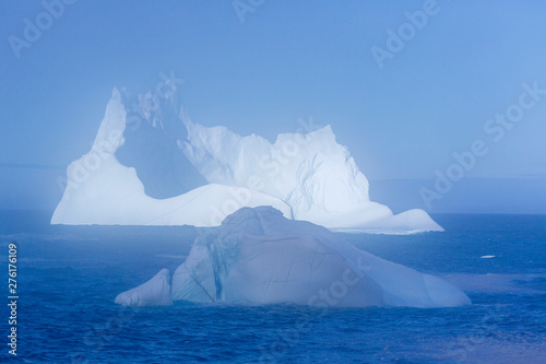 An iceberg along the Newfoundland coastline in summer, very popular with tourist.