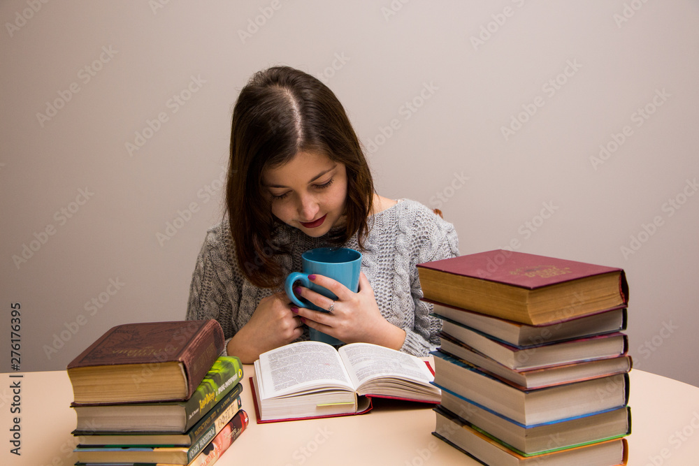 Student girl with stack of books Student girl with stack of books