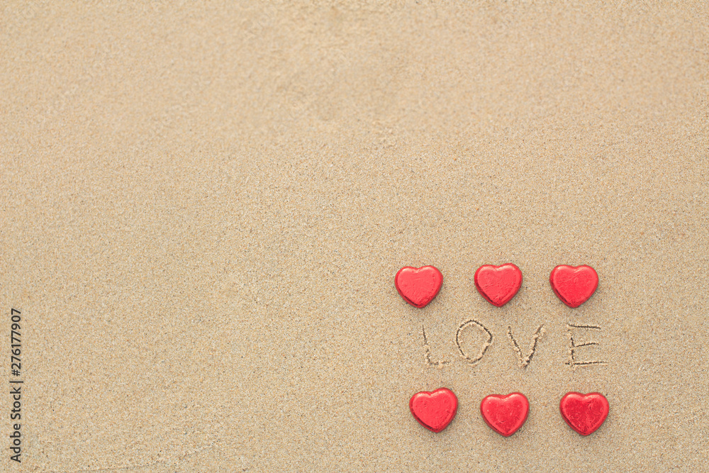 Chocolate color Lovely red heart on the beach. Background is a natural in real place, creative Valentine's Day Concept, tropical style background made in Phuket, Thailand.