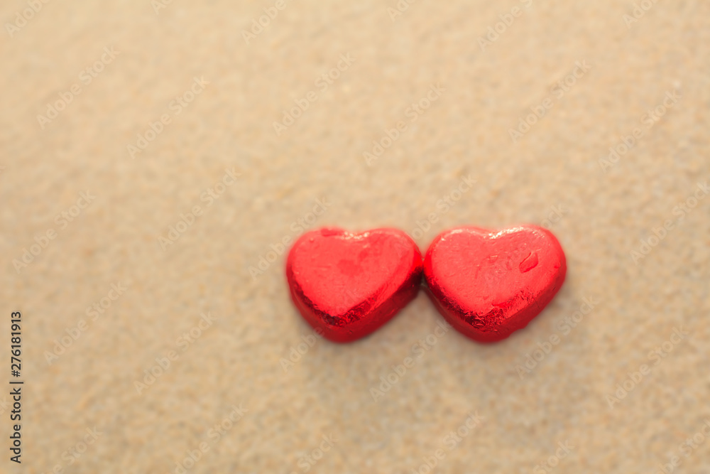 Chocolate color Lovely red heart on the beach. Background is a natural in real place, creative Valentine's Day Concept, tropical style background made in Phuket, Thailand. Chocolate color Lovely red heart on the beach. Background is a natural in real place, creative Valentine's Day Concept, tropical style background made in Phuket, Thailand.