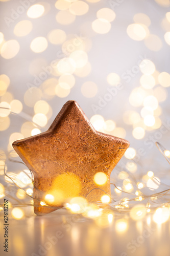 Christmas bokeh background with decorative star.