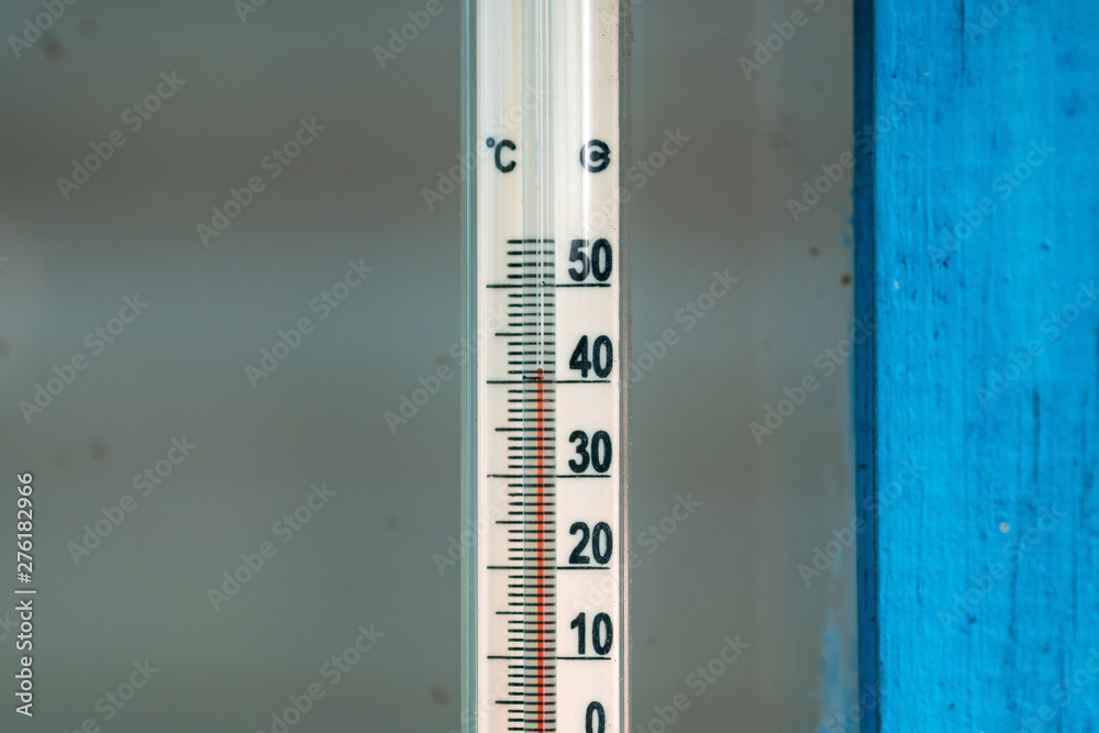 Celsius thermometer with high temperature, hot weather concept Celsius thermometer with high temperature, hot weather concept