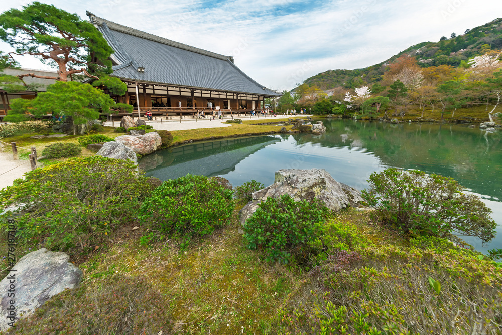 Fototapeta premium Garden with pond in front of Tenryu-ji Temple at Arashiyama, Kyoto, Japan
