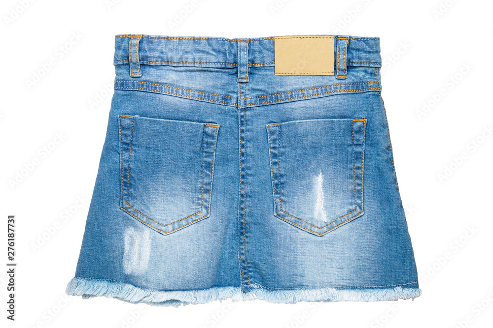 Jeans skirt. Close-up of sexy short blue jeans skirt isolated on a white background. Denim fashion for girls. Back site. Jeans skirt. Close-up of sexy short blue jeans skirt isolated on a white background. Denim fashion for girls. Back site.