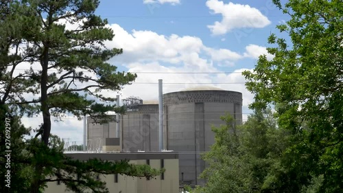 Time Lapse-Clouds blow past cooling towers for Nuclear Power Plant in South Carolina photo